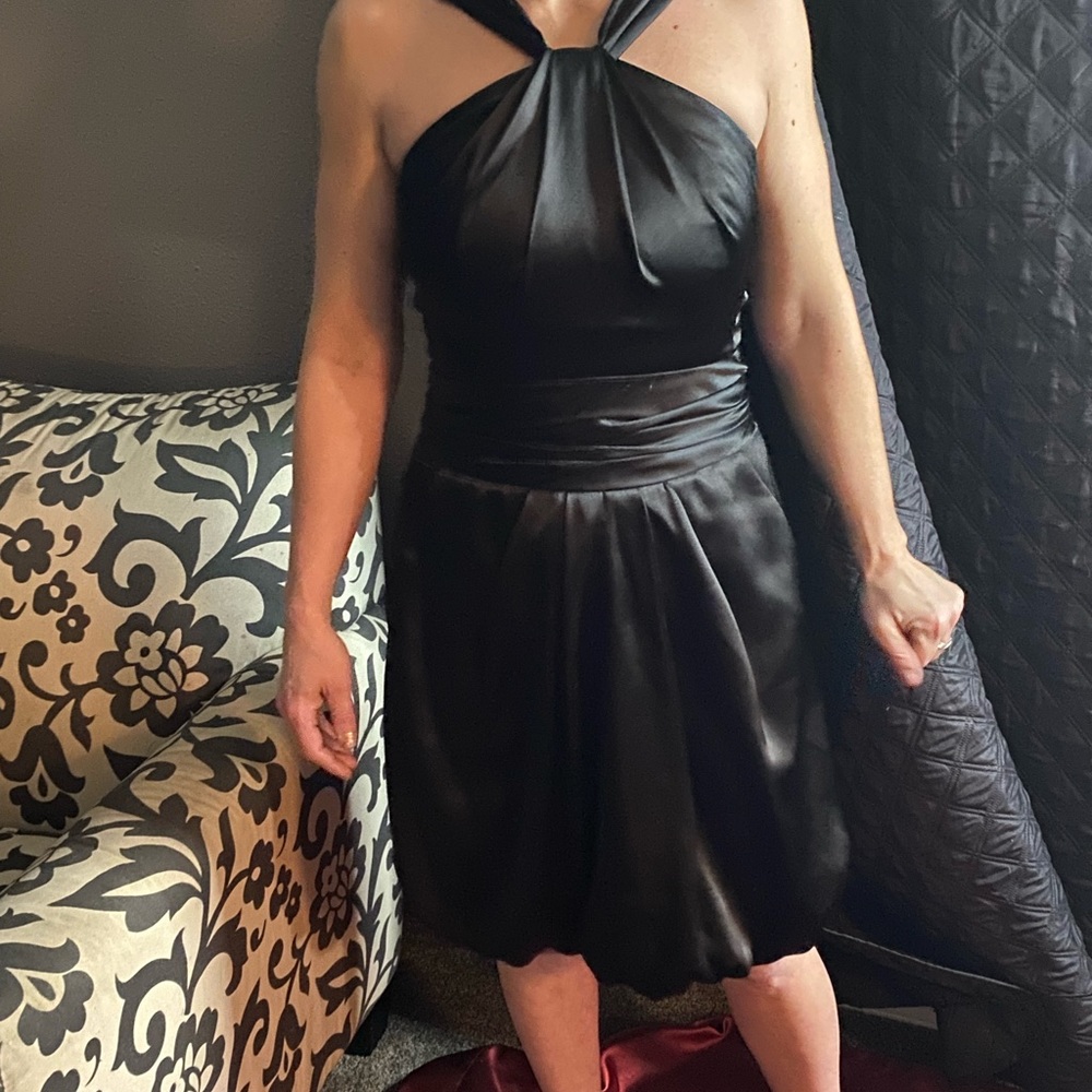 A size 4, David's Bridal bridesmaid  dress with pockets.